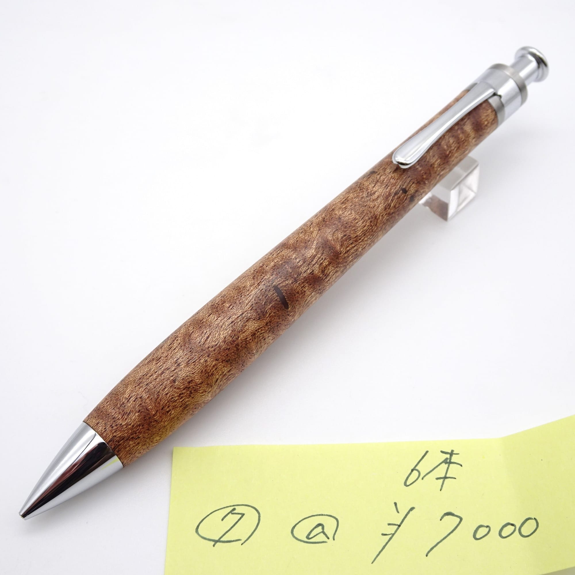 Setsu figured sapele mechanical pencil, lot 7, photographed with the maker’s numbered price note.