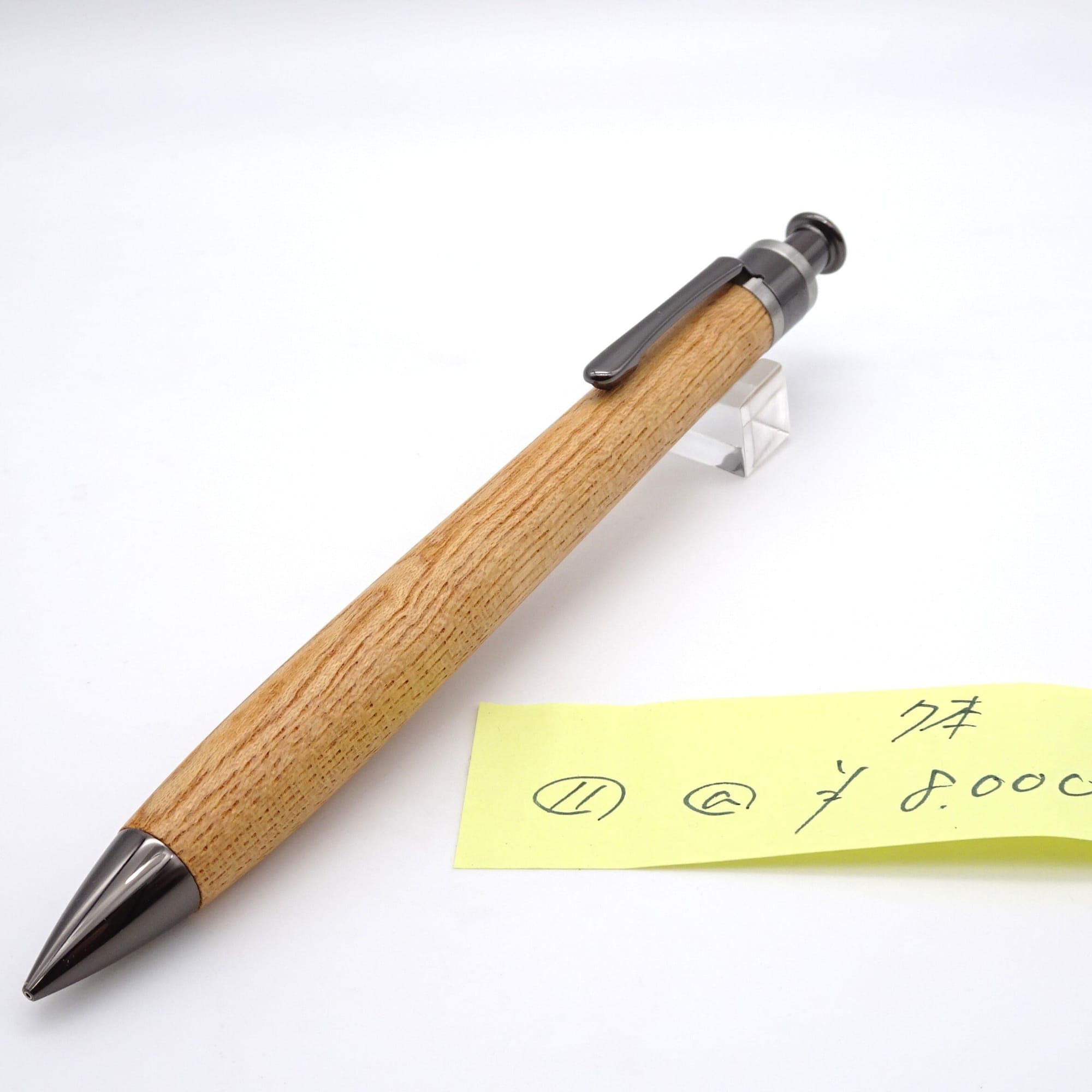 Setsu zelkova · gunmetal mechanical pencil, lot 11, photographed with the maker’s numbered price note.