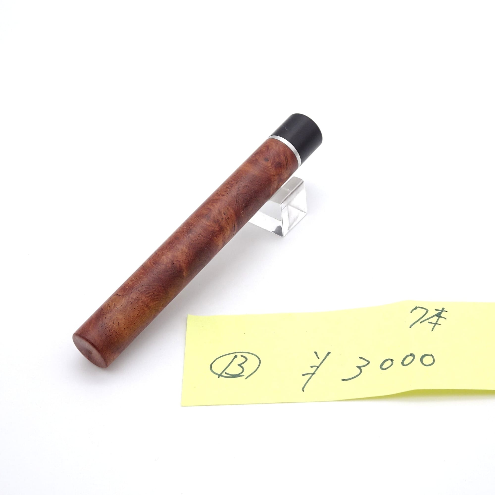 Setsu karin-burl lead case, lot 13, photographed with the maker’s numbered price note.