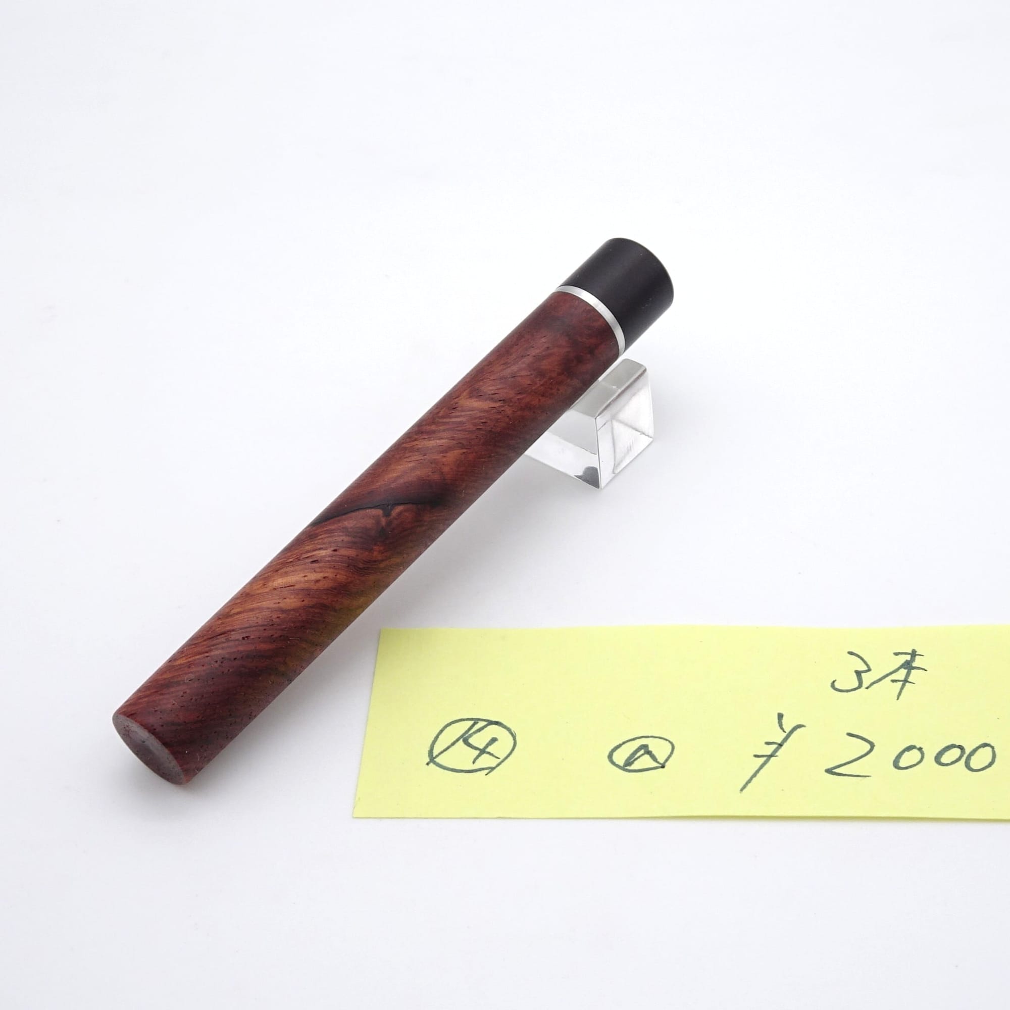 Setsu karin-burl lead case, lot 14, photographed with the maker’s numbered price note.
